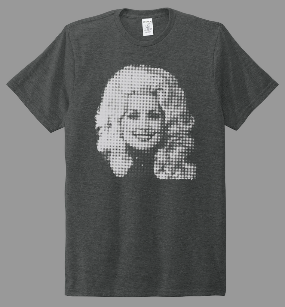 A dark heather gray short-sleeve t-shirt featuring a black and white graphic print of Dolly Parton on the front, displayed against a solid white background.