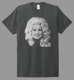 A dark heather gray short-sleeve t-shirt featuring a black and white graphic print of Dolly Parton on the front, displayed against a solid white background.